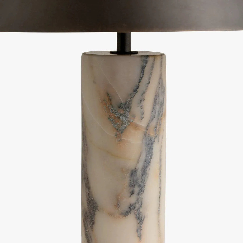 Black marble table lamp with modern simplicity design on a wooden table