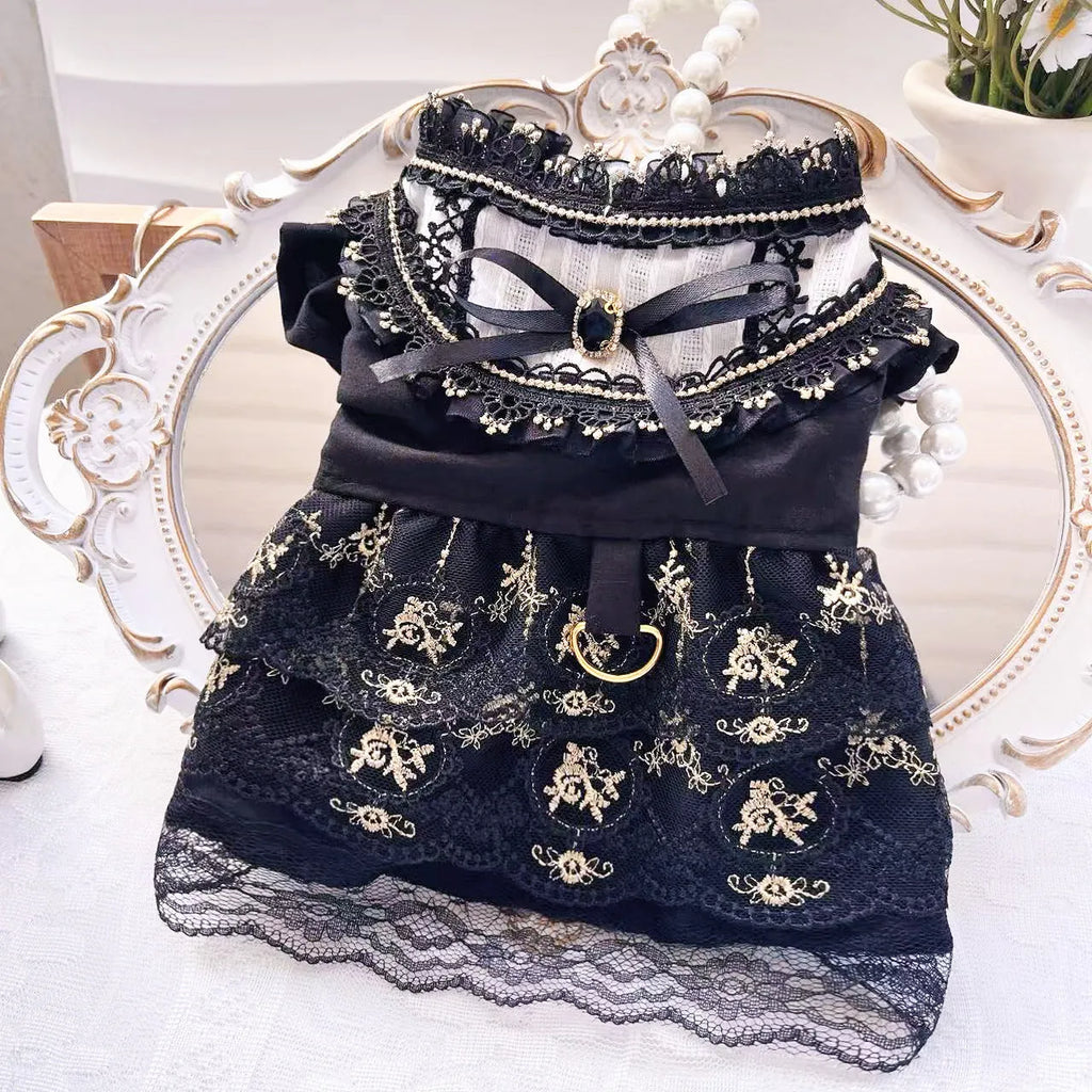 Golden gothic-style skirt dress for cats or dogs on a mannequin showing princess design and polyester fabric