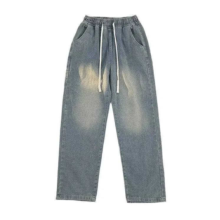 Men's loose fit straight-leg jeans in black or blue with drawstring waist closure