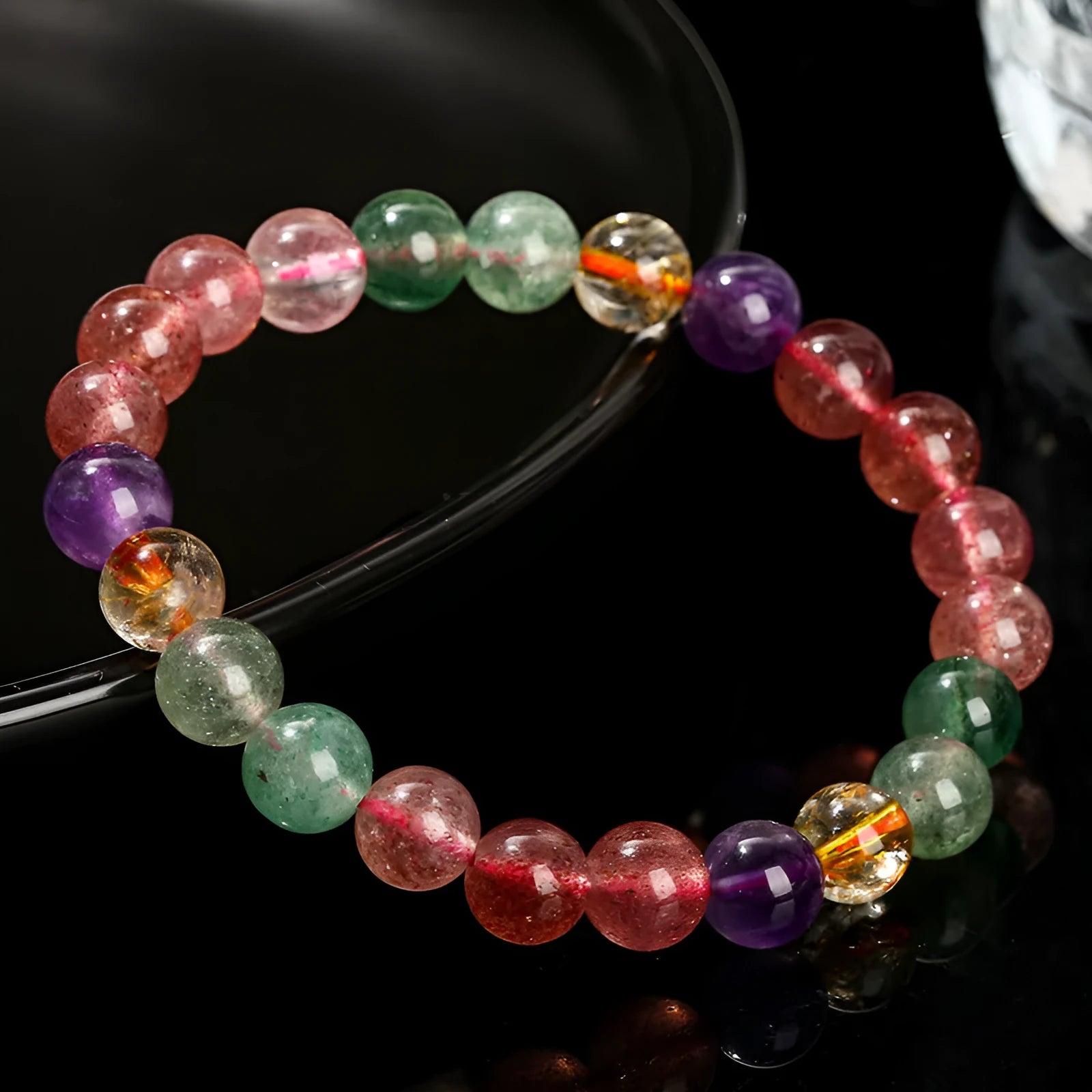 Natural tourmaline colour strawberry quartz bracelet with round geometry beads.