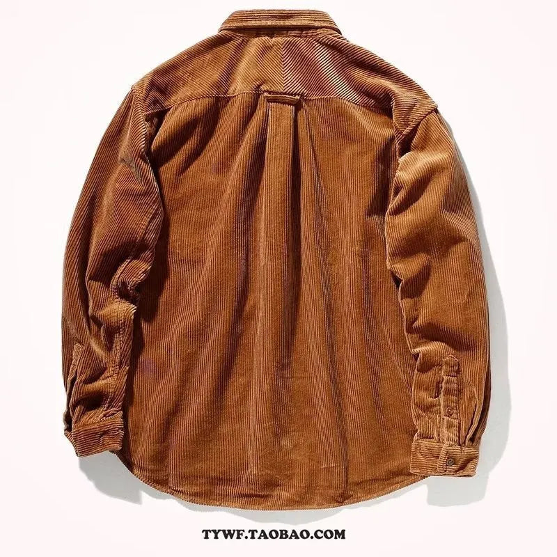 Man wearing a loose caramel coloured corduroy cardigan shirt in Hong Kong style.