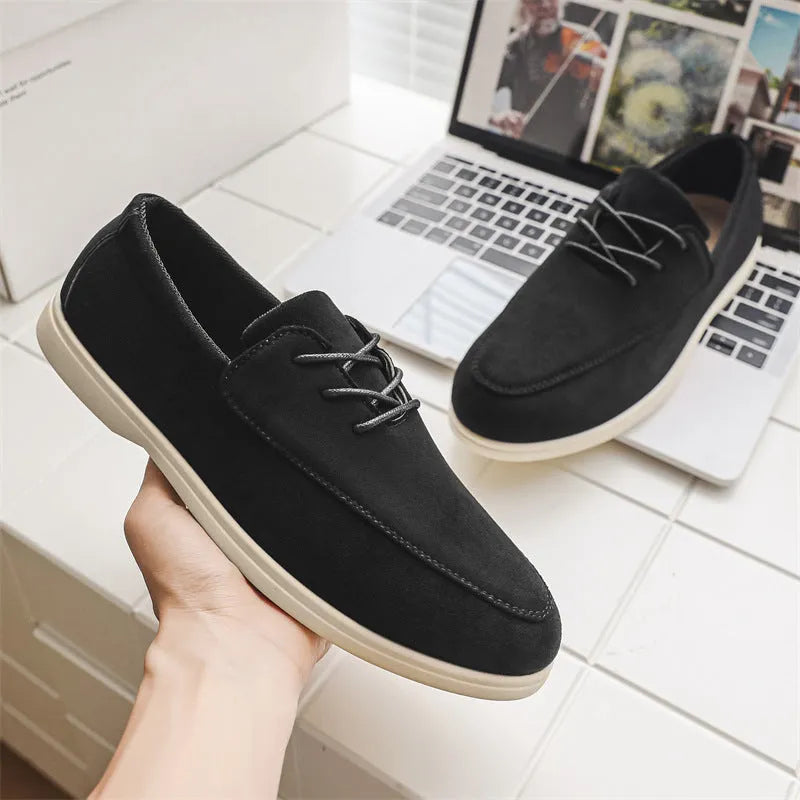 Men's slip-on suede loafers in beige with elastic band and rubber sole, side view
