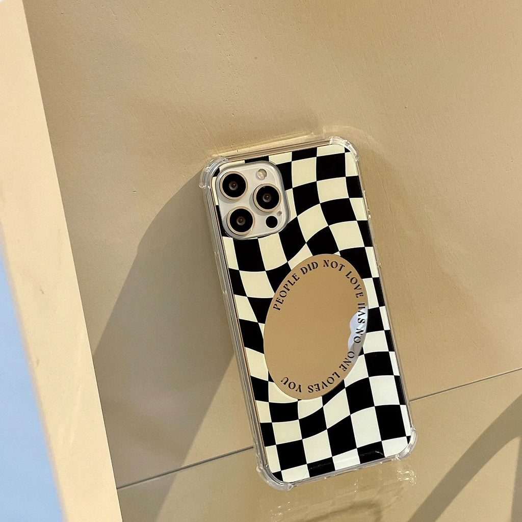 Mirror phone case with chessboard plaid pattern against black background