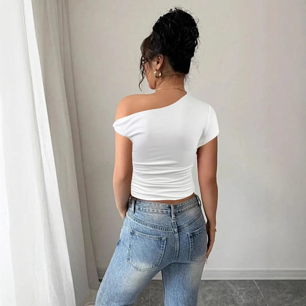 Women's white polyester slim fit top with oblique shoulder neckline and raglan sleeves