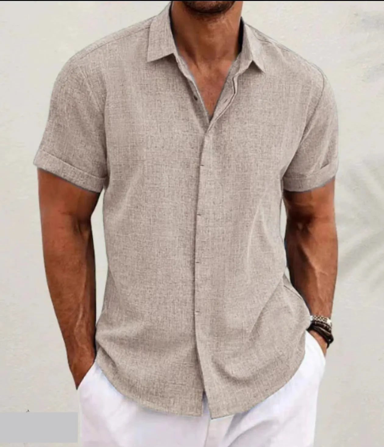 Men's light grey loose fit cotton blend cardigan with long sleeves on a hanger.
