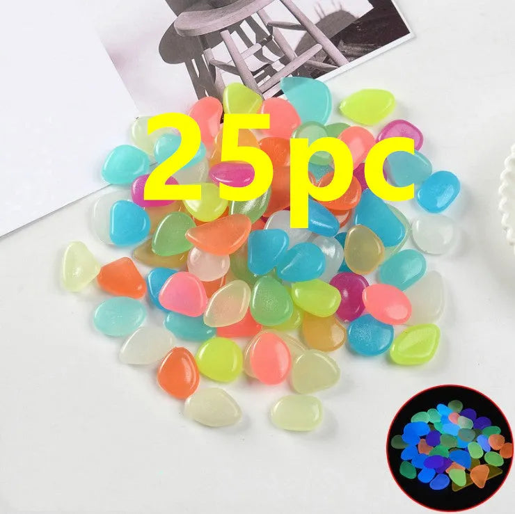 Luminous fluorescent aquarium and garden pebbles in mixed colours including dark purple, yellow, light blue, pink, orange