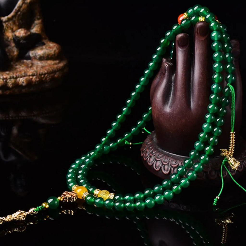 Handmade multi-strand bracelet made with round green agate beads from Brazil