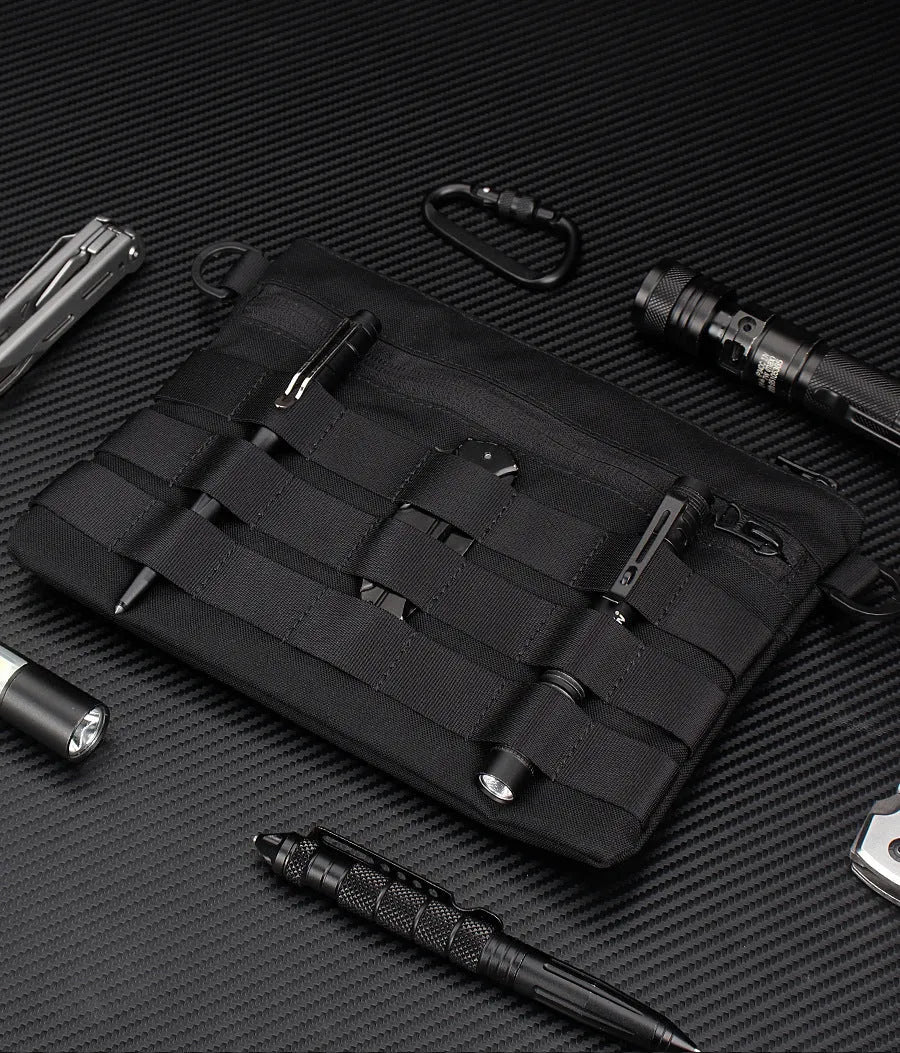 Black Oxford cloth portable outdoor organiser kit measuring 18 by 3.5 centimetres