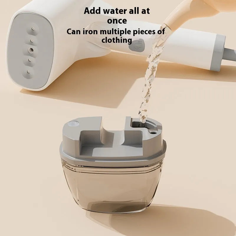 Blue handheld garment steamer unit with water tank and nozzle, showing compact size.