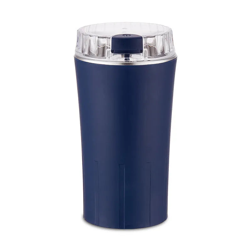 Blue mini flour mill and grinder machine with stainless steel construction for grinding spices and grains.