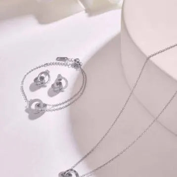 Women's Rome Double Ring Necklace in steel grey titanium steel with O-link chain on white background