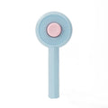Blue cat grooming brush with self-cleaning button and angled wire needles on white background, 170x80x45mm