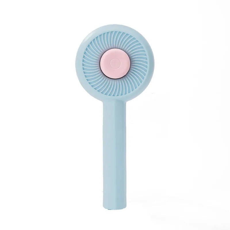 Blue pet grooming brush with angled metal needles and self-cleaning button on handle