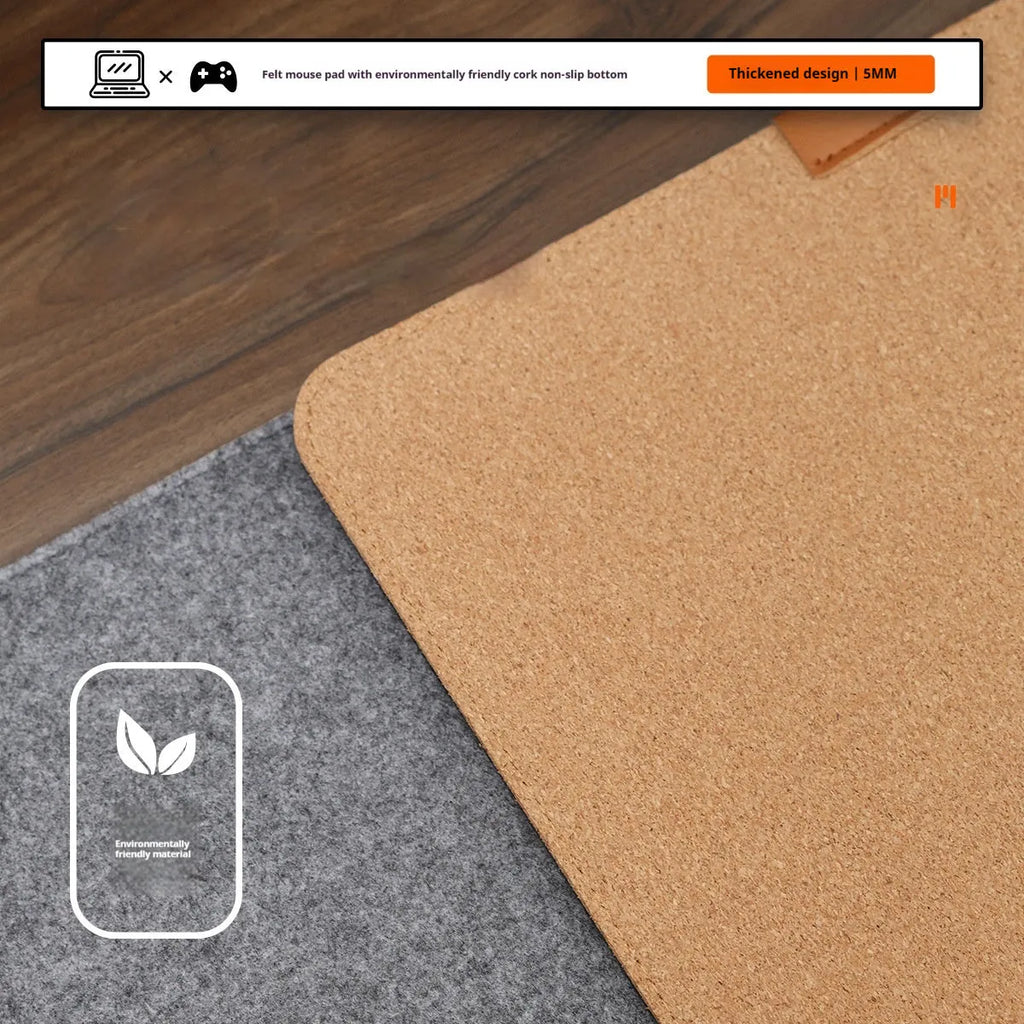 Felt cork desk mat in black gray pattern on a wooden desk with a mouse and keyboard