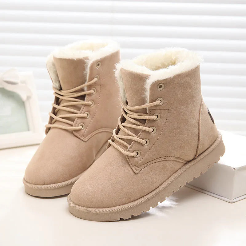 Women's lace up platform snow boots in suede with faux fur lining, flat heel, round toe, available in multiple colours