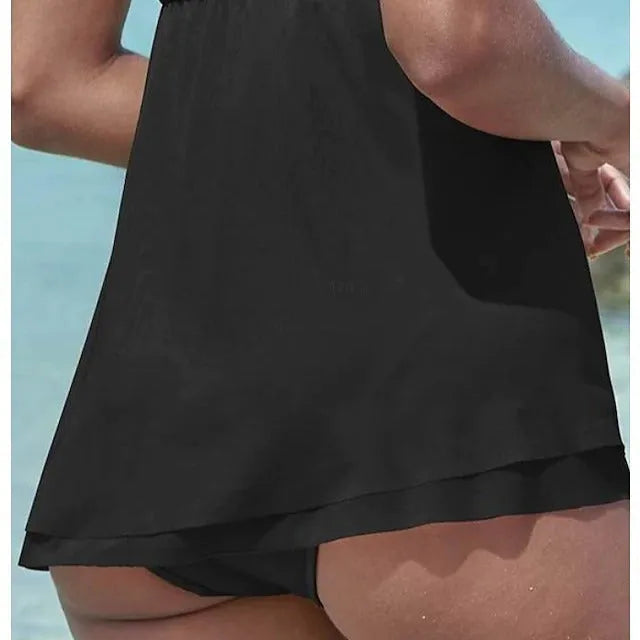 Women's strapless solid colour one-piece swimsuit dress in polyester fabric on a mannequin