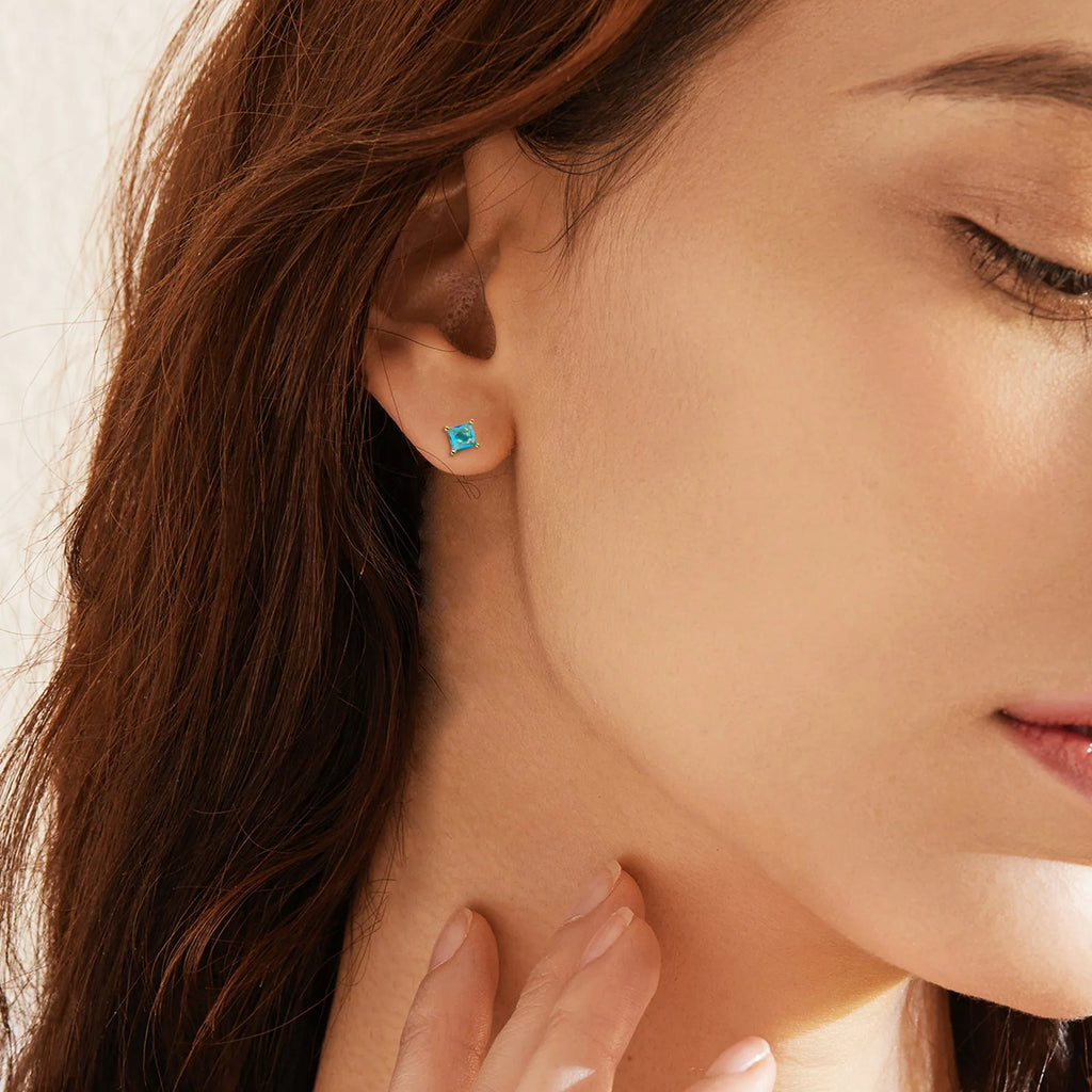 Brass gold-plated drop earrings with pear-shaped candy-coloured zircon stones in simple design
