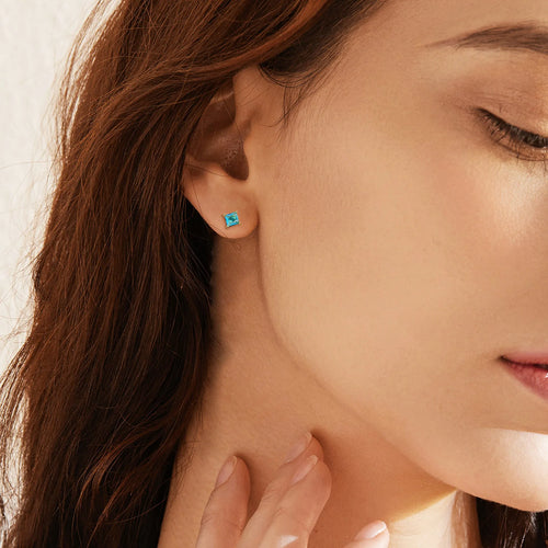 Brass gold-plated drop earrings with pear-shaped candy-coloured zircon stones in simple design