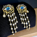 Gold plated artificial crystal zircon long tassel earrings with vintage eye design and Sterling Silver needle