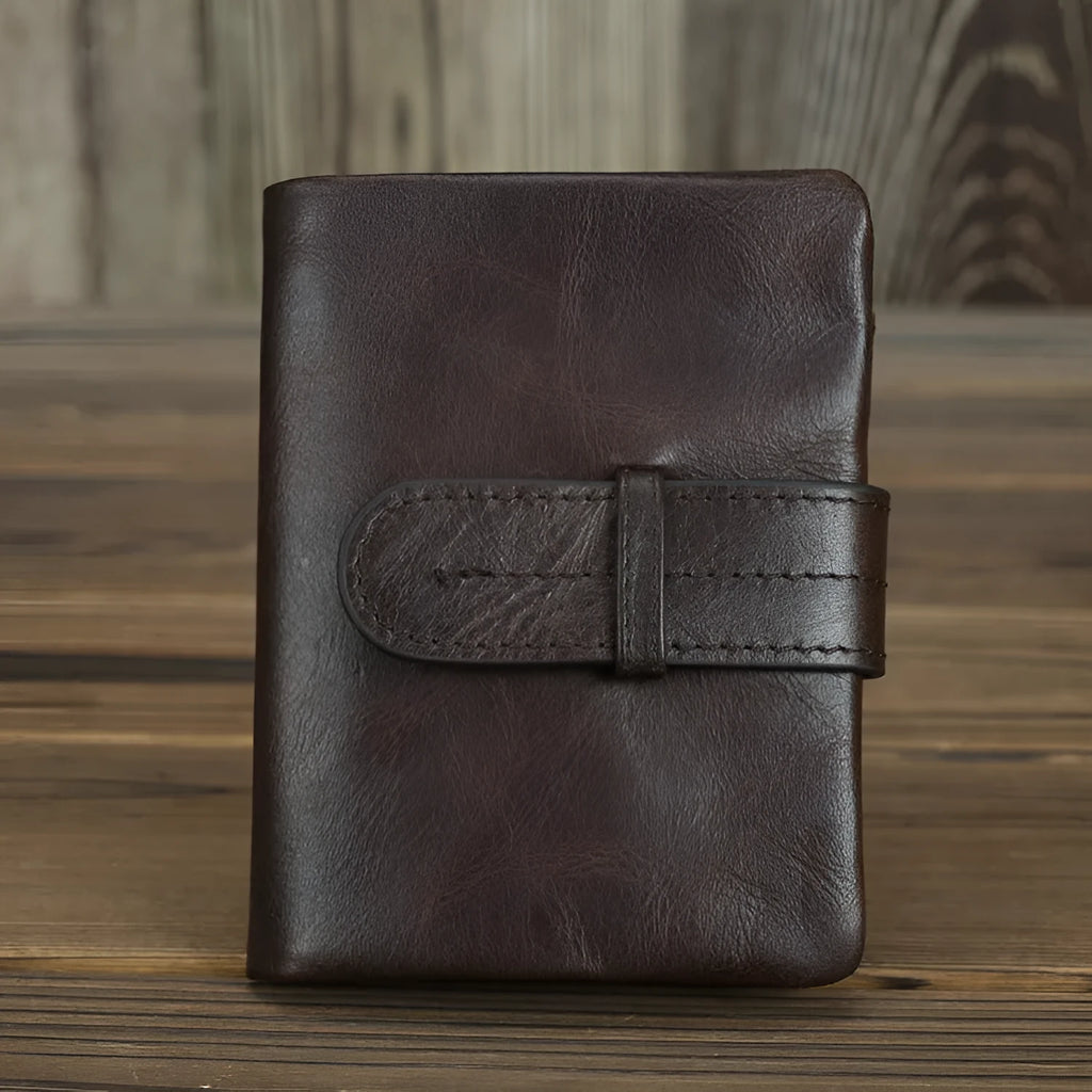 Genuine leather women's wallet in black showing vertical style with multiple card slots