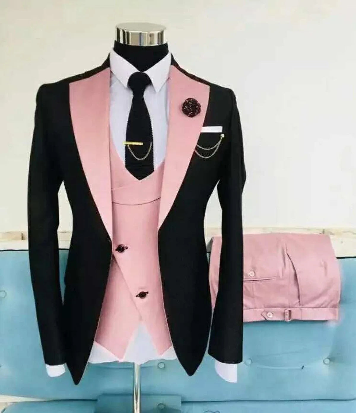 Men's slim fit three-piece suit in a light business style with coat, vest, and trousers