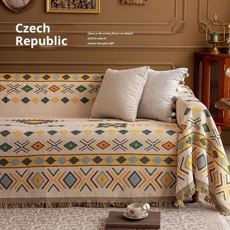 Oil painting cotton braided sofa slipcover with geometric pattern on a beige sofa, vintage colours, full coverage design