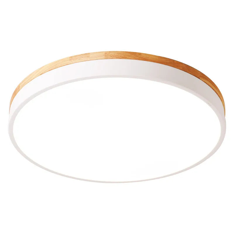 Round Scandinavian style wood and iron LED ceiling lamp with a white acrylic shade on a white ceiling.