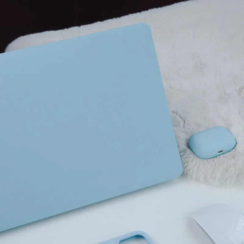 Dream Blue 16 inch laptop sleeve with colourful sticker-style print, open showing inner lining
