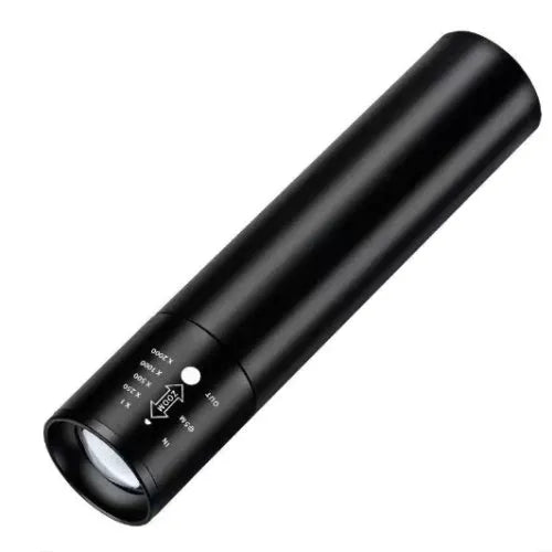 Handheld black aluminium red light mosquito repellent lamp with USB charging cable.