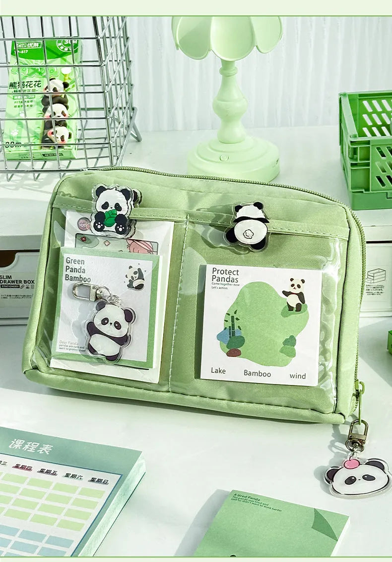 Green canvas pencil case with 12-layer panda design and multiple compartments for stationery organisation