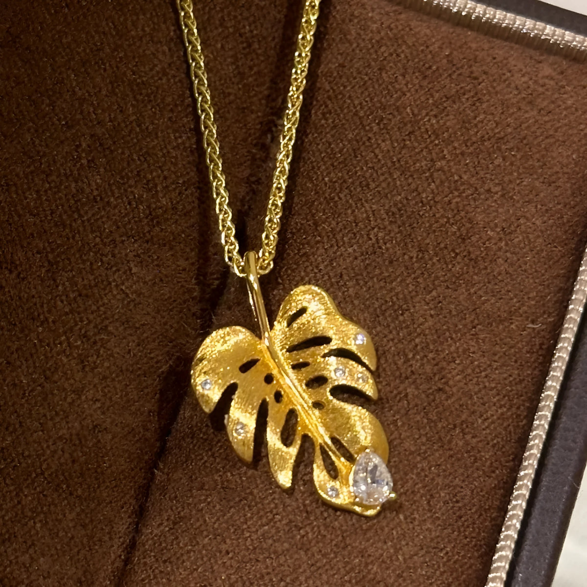 925 silver diamond pendant necklace with geometric bamboo leaf shape and Chopard chain on silver tone