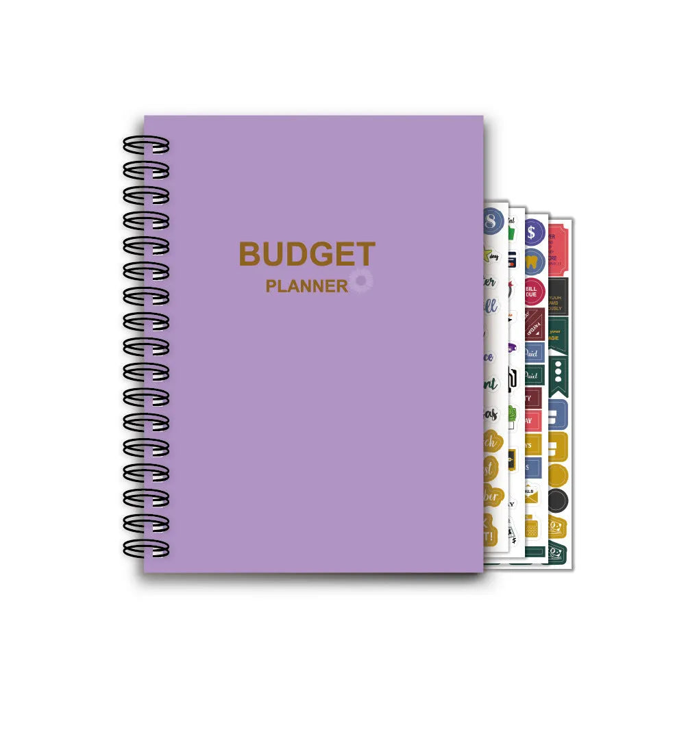 J12 purple coil-bound financial planning notebook with budget stickers and paper clips on Daolin paper pages