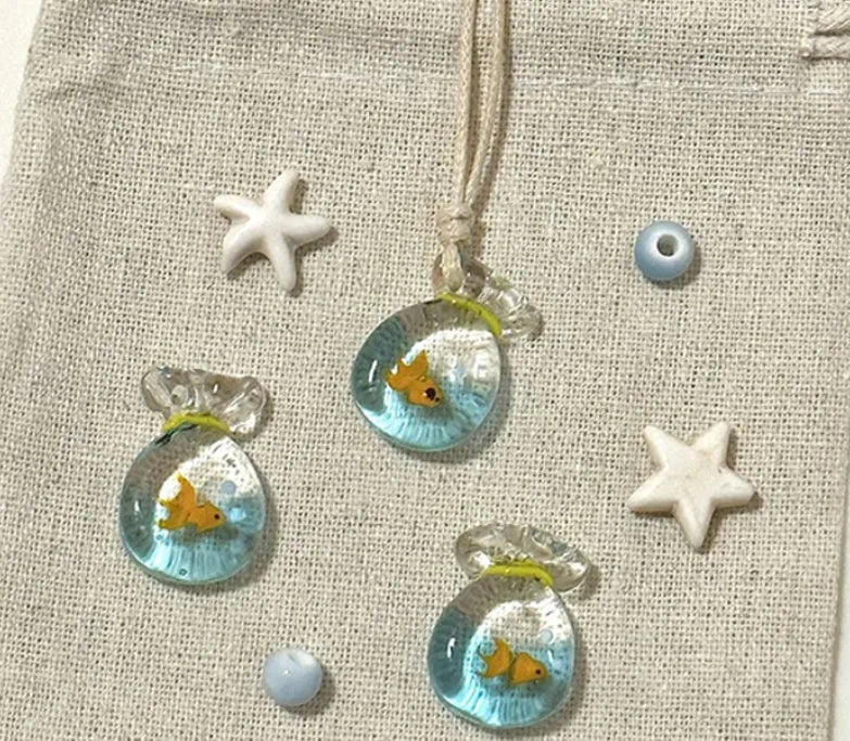 Women's necklace with coloured glaze skirt pendant on cotton linen clavicle chain
