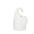DOMI Elephant style silicone and plastic LED night light with warm white glow on a bedside table.