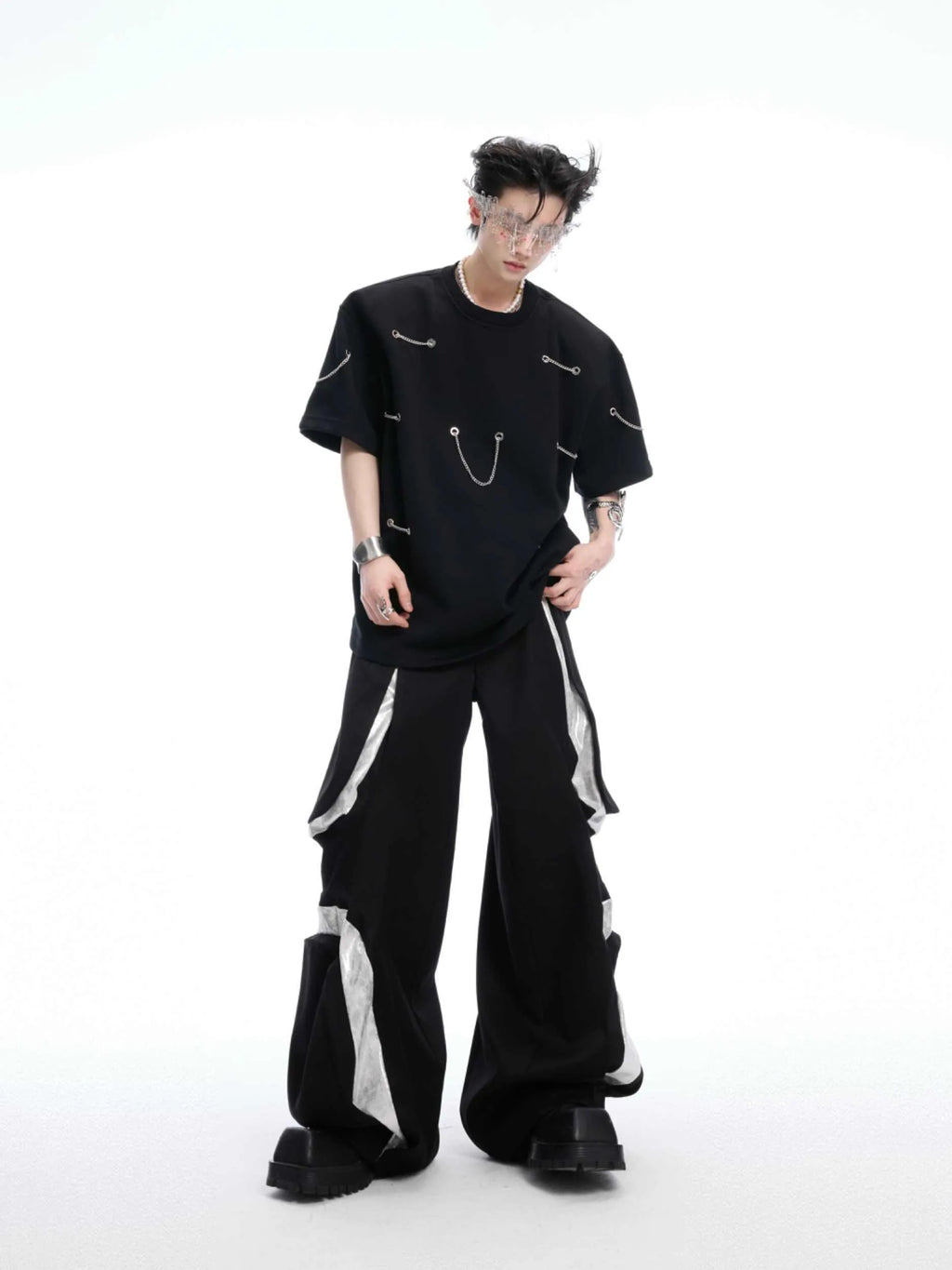 Black heavy cotton t-shirt with metal chain padded shoulder detail, round neck, short sleeves