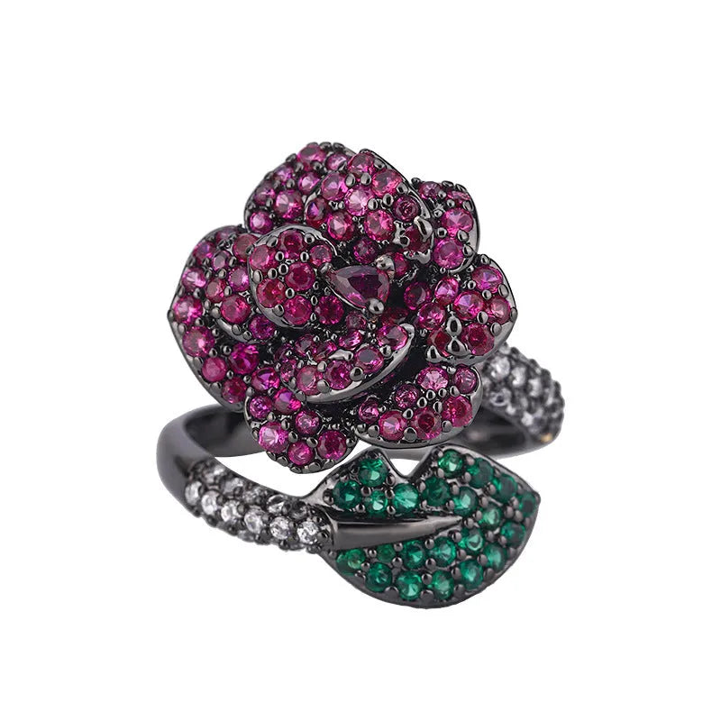 Gold-plated black gold geometric flower ring with simulation red corundum stones