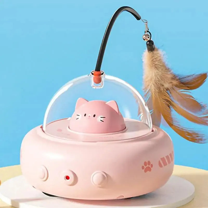 Electric cat interactive toy with pink feather wand and red light beam on a white floor