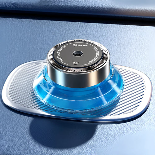 Smart spray car air freshener unit in Gentleman's Black or Qian Shan Cui colours with Ocean and Gulong fragrance refill bottles