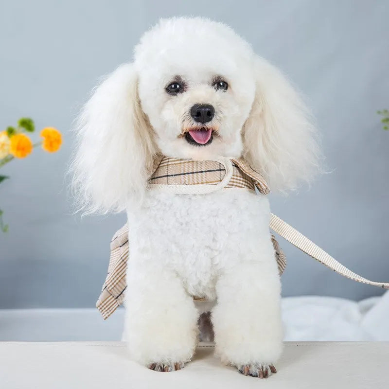 Milky white and purple pet vest harnesses with integrated hand-holding rope and skirt.