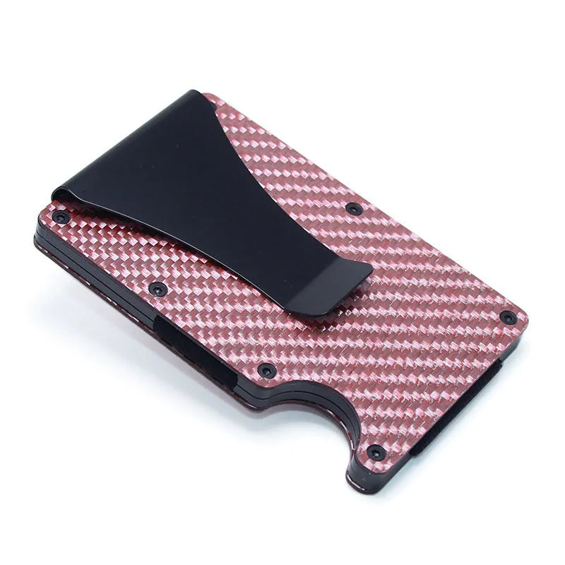 A slim carbon fibre card holder wallet in a geometric design, shown with business cards.