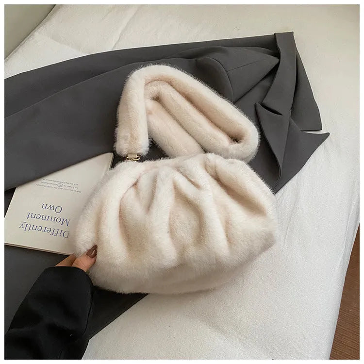 Pleated Cloud women's furry plush bucket handbag in white with stitching detail and shoulder strap