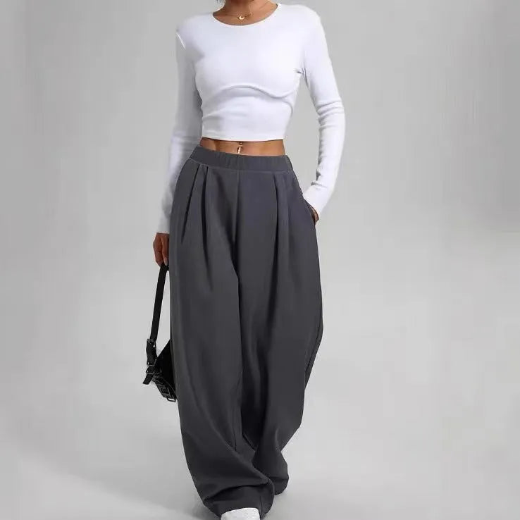 Women's high-waisted loose straight pants with pockets in black polyester fabric