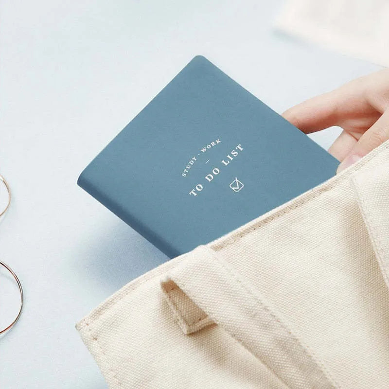 A 48K to-do list notebook with a PU cover in blue, showing its 96 pages of eye protection paper.
