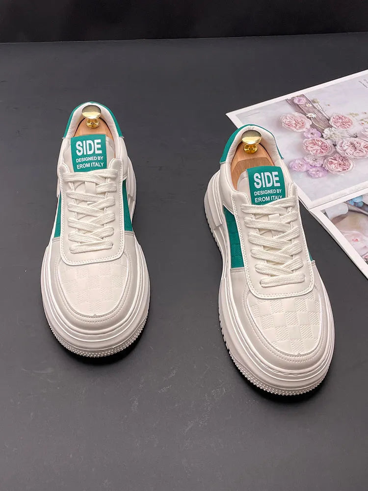 White, green and black sports casual shoes with cloth upper and rubber foam sole showing heel lift insert option