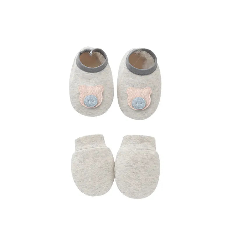 Cotton baby gloves and foot cover set in multiple colours including light blue, navy blue, pink, and camel