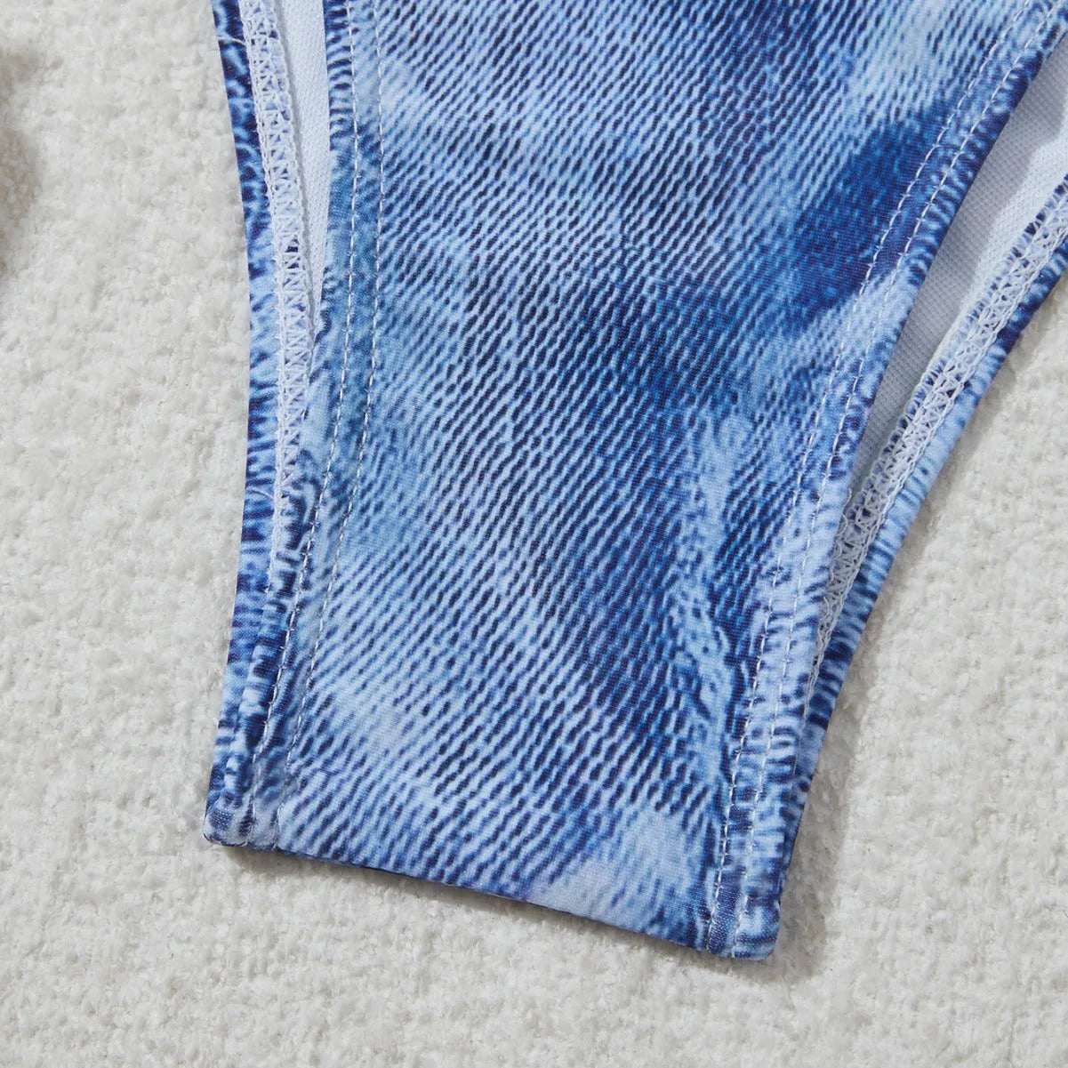 Women's denim blue printed bikini set with strappy design, two-piece swimwear for beach and pool