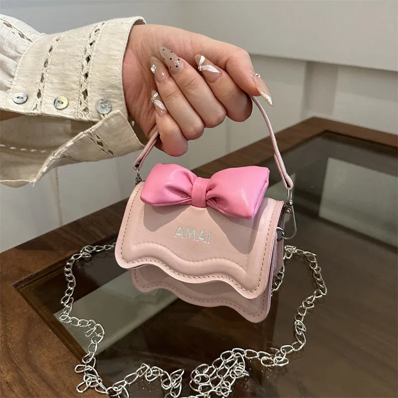 Mini PU crossbody bag in seven colour options with adjustable shoulder strap