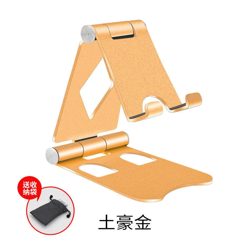 Aluminium alloy folding mobile phone desktop stand in black colour on a desk surface
