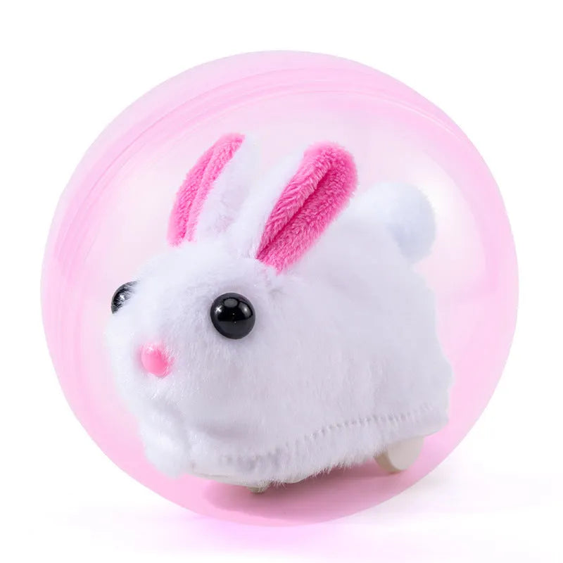 Transparent plastic hamster rolling ball with plush shell in beige hamster design and battery base