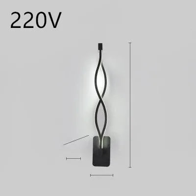 Minimalist Nordic design LED wall lamp with a silicone shade, mounted on a bedroom wall.